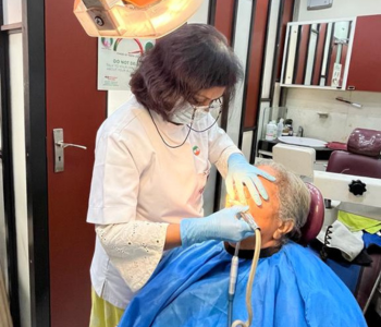 top dentist mr sawon barman treating patients at smile signature.