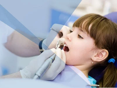 laser dentistry performed at female child at smile signature dental clinic